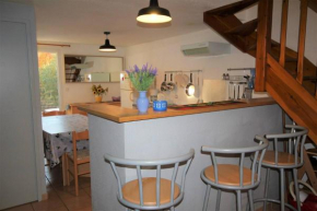 Belle villa entièrement climatisée 4 chambres 10 couchages, fibre WIFI, 2 terrasses parking privatif dans résidence sécurisée piscine commune 800 m de la mer LRCS69